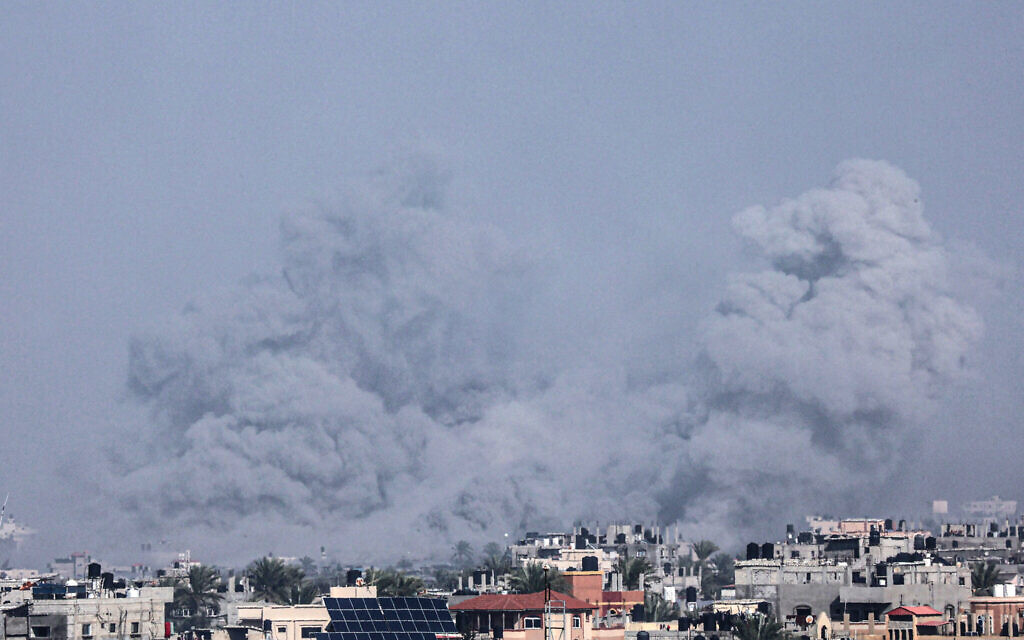 A picture taken from Rafah shows smoke billowing over Khan Yunis in the southern Gaza Strip during Israeli bombardment on January 9, 2024. (AFP)