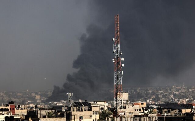 A picture taken from Rafah shows smoke billowing over Khan Younis in the southern Gaza Strip during Israeli shelling on January 10, 2024. (AFP) A picture taken from Rafah shows smoke billowing over Khan Younis in the southern Gaza Strip during Israeli shelling on January 10, 2024. (AFP)