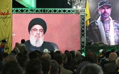 Hezbollah leader Hassan Nasrallah delivers a televised speech in Kherbet Selm in southern Lebanon on January 14, 2024. (Mahmoud ZAYYAT / AFP)