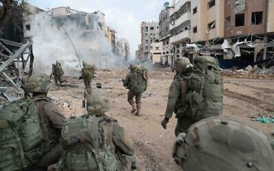 Israeli soldiers operate in the Gaza Strip in an undated handout photo released by the military on January 2, 2024. (Israel Defense Forces)