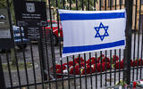 File: Around 900 red roses were placed at the Israeli embassy in Stockholm in solidarity and support with the country on October 11, 2023. (Jonathan Nackstrand/AFP)