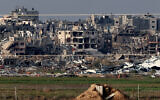A picture taken from southern Israel shows destroyed buildings in the Gaza Strip on January 17, 2024. (JACK GUEZ / AFP)