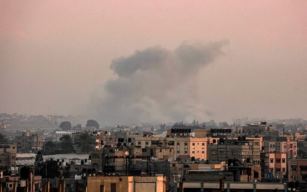 A picture taken from Rafah on January 23, 2024 shows smoke over Khan Younis in the southern Gaza Strip during Israeli  strikes (AFP)
