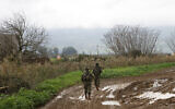 Illustrative: Israeli soldiers patrol an area near the northern Kibbutz Kfar Blum close to the border with Lebanon on January 25, 2024. (Jalaa Marey/AFP)
