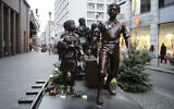 A statue commemorating the Kindertransport near Friedrichstrasse train station in Berlin, Germany, December 17, 2018. (AP Photo/Markus Schreiber)