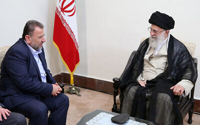 Iran's Supreme Leader Ayatollah Ali Khamenei, right, meets Hamas deputy chief, Saleh al-Arouri, in Tehran, Iran, Monday, July 22, 2019. (Office of the Iranian Supreme Leader via AP)