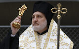 File: Greek Orthodox Archbishop Elpidophoros leads a celebration of St. Nicholas Day, at the St. Nicholas National Shrine at the World Trade Center in New York on December 6, 2019. (AP Photo/Mark Lennihan)