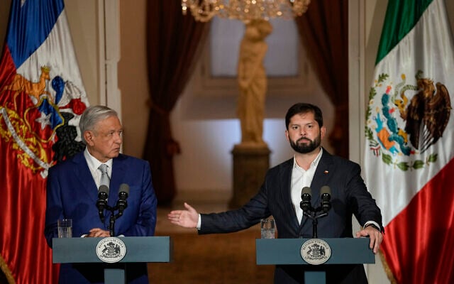 Chile's President Gabriel Boric, right, gestures next to Mexico's President Manuel Lopez Obrador during joint declaration at La Moneda presidential palace in Santiago, Chile, Sunday, September 10, 2023. (AP/Esteban Felix) Chile's President Gabriel Boric, right, gestures next to Mexico's President Manuel Lopez Obrador during joint declaration at La Moneda presidential palace in Santiago, Chile, Sunday, September 10, 2023. (AP/Esteban Felix)