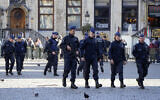 Belgian Police patrol the Grand Place in central Brussels, October 17, 2023. (Martin Meissner/AP)
