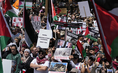 People gather during an anti-Israel rally in Sydney, Saturday, October 21, 2023. (AP Photo/Rick Rycroft)