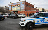 Illustrative: New York City police officers work the scene of a shooting outside the 41st precinct, February 9, 2020, in New York. (AP Photo/John Minchillo, File)