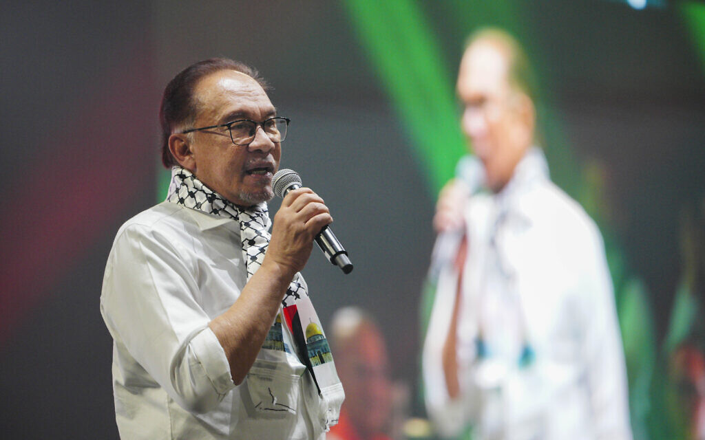 Malaysian Prime Minister Anwar Ibrahim speaks at an anti-Israel, pro-Palestinian rally in Kuala Lumpur, Malaysia, October 24, 2023. (AP Photo/Vincent Thian)