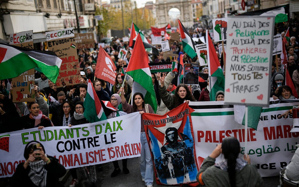 Demonstrators march during an anti-Israel rally in Marseilles, southern France, December 9, 2023. (AP Photo/Daniel Cole)