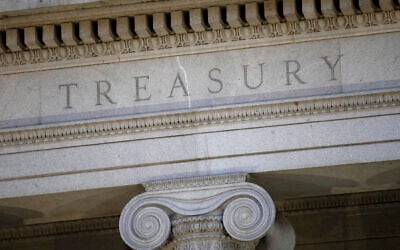 The US Treasury Department building is shown at dusk in Washington on June 6, 2019. (AP Photo/Patrick Semansky)