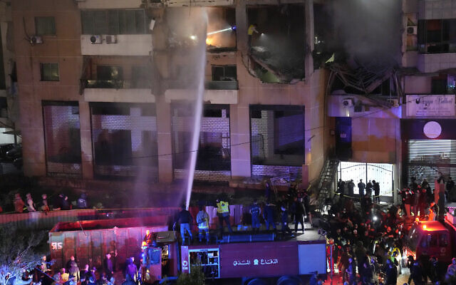 Firefighters extinguish the fire inside an apartment following a massive explosion in the southern suburb of Beirut, Lebanon, on Tuesday, January 2, 2024, in which Hamas deputy leader Saleh al-Arouri was killed. (AP Photo/Hussein Malla) Firefighters extinguish the fire inside an apartment following a massive explosion in the southern suburb of Beirut, Lebanon, on Tuesday, January 2, 2024, in which Hamas deputy leader Saleh al-Arouri was killed. (AP Photo/Hussein Malla)