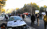People gather at the site of an explosion in the city of Kerman, about 510 miles (820 kilometers) southeast of Tehran, Iran, January 3, 2024. (Sare Tajalli/ISNA via AP)