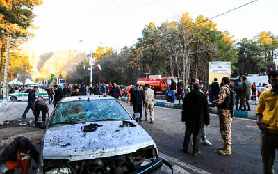 People gather at the site of an explosion in the city of Kerman, about 510 miles (820 kilometers) southeast of Tehran, Iran, January 3, 2024. (Sare Tajalli/ISNA via AP)
