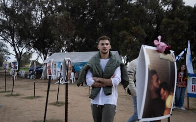 Itay Regev visits the site where he and his sister Maya were kidnapped on October 7 at the Supernova music festival, January 5, 2024. (AP Photo/Maya Alleruzzo)