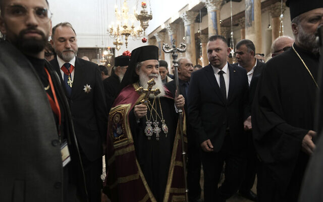 Greek Orthodox Patriarch of Jerusalem Teophilos III walks in the Nativity Church, where Christians believe Jesus Christ was born on the eve of the Orthodox Christmas in Bethlehem, West Bank, Saturday, Jan. 6, 2024. (AP/Mahmoud Illean) Greek Orthodox Patriarch of Jerusalem Teophilos III walks in the Nativity Church, where Christians believe Jesus Christ was born on the eve of the Orthodox Christmas in Bethlehem, West Bank, Saturday, Jan. 6, 2024. (AP/Mahmoud Illean)