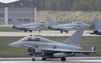 A Eurofighter from the German Air Force Weapons School takes off for an exercise in Large, Germany, April 30, 2021. (Bernd Wuestneck/dpa via AP, File)