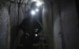 Israeli soldiers show journalists an underground tunnel where the IDF said it had found evidence hostages were held by terrorists in Khan Younis, Gaza Strip, on January 10. 2024. (AP Photo/Ohad Zwigenberg)