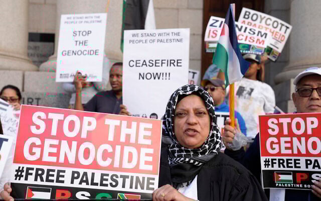Pro-Palestinian, anti-Israel activists picket outside the High Court in Cape Town, South Africa, Jan. 11, 2024 (AP Photo/Nardus Engelbrecht) Pro-Palestinian, anti-Israel activists picket outside the High Court in Cape Town, South Africa, Jan. 11, 2024 (AP Photo/Nardus Engelbrecht)