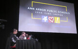 The Ann Arbor Public Schools board discusses a resolution calling for a ceasefire in the Israel-Hamas war at Pioneer High School, in Ann Arbor, Michigan, January 17, 2024. (Joey Cappelletti/AP)