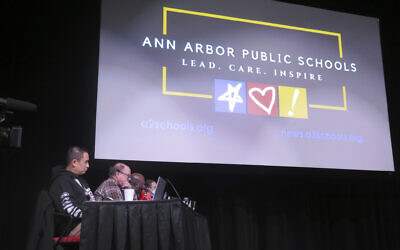 The Ann Arbor Public Schools board discusses a resolution calling for a ceasefire in the Israel-Hamas war at Pioneer High School, in Ann Arbor, Michigan, January 17, 2024. (Joey Cappelletti/AP)
