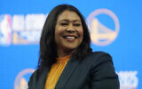 San Francisco Mayor London Breed smiles during a news conference at the Chase Center in San Francisco, California, on November 6, 2023. (AP Photo/ Jeff Chiu)