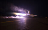 This image provided by the US Navy shows an aircraft launching from USS Dwight D. Eisenhower (CVN 69) during flight operations in the Red Sea, Jan. 22, 2024. (Kaitlin Watt/US Navy via AP)