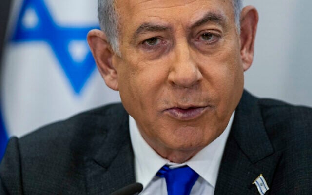 Prime Minister Benjamin Netanyahu chairs a cabinet meeting at the Kirya military base in Tel Aviv on December 24, 2023. (AP Photo/ Ohad Zwigenberg, Pool) Prime Minister Benjamin Netanyahu chairs a cabinet meeting at the Kirya military base in Tel Aviv on December 24, 2023. (AP Photo/ Ohad Zwigenberg, Pool)