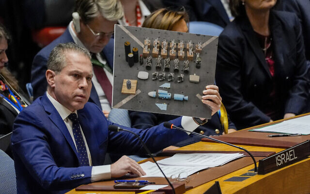 Israel’s UN Ambassador Gilad Erdan speaks while holding a photo of weapons sent by Iran to Houthi rebels in Yemen that were intercepted by US forces, during a UN Security Council meeting at United Nations headquarters, on January 23, 2024. (Peter K. Afriyie/AP) Israel’s UN Ambassador Gilad Erdan speaks while holding a photo of weapons sent by Iran to Houthi rebels in Yemen that were intercepted by US forces, during a UN Security Council meeting at United Nations headquarters, on January 23, 2024. (Peter K. Afriyie/AP)