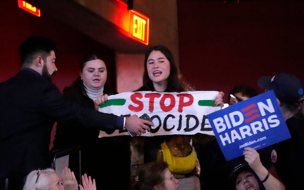 A protester calling for a ceasefire in Gaza interrupts US President Joe Biden during an event on the campus of George Mason University in Manassas, Virginia, January 23, 2024 (Alex Brandon/AP) A protester calling for a ceasefire in Gaza interrupts US President Joe Biden during an event on the campus of George Mason University in Manassas, Virginia, January 23, 2024 (Alex Brandon/AP)
