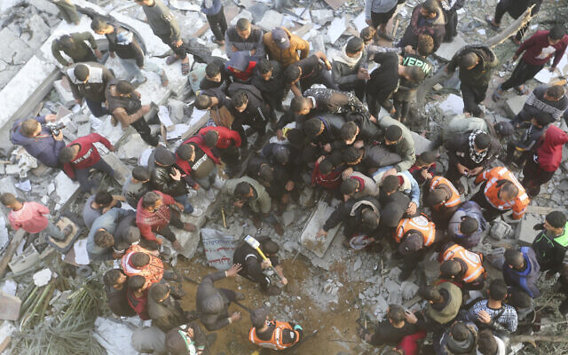 Palestinians look for survivors at a mosque destroyed in an Israeli strike in Rafah, Gaza Strip. Wednesday, Jan. 24, 2024.(AP Photo/Hatem Ali) Palestinians look for survivors at a mosque destroyed in an Israeli strike in Rafah, Gaza Strip. Wednesday, Jan. 24, 2024.(AP Photo/Hatem Ali)