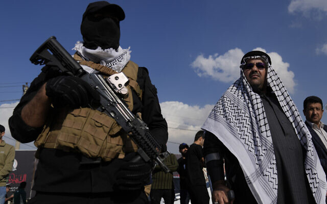Members of an Iraqi Shiite militant group attend the funeral of a fighter with the Kataib Hezbollah, who was killed in a US airstrike, in Baghdad, Iraq, January 25, 2024. (AP Photo/Hadi Mizban) Members of an Iraqi Shiite militant group attend the funeral of a fighter with the Kataib Hezbollah, who was killed in a US airstrike, in Baghdad, Iraq, January 25, 2024. (AP Photo/Hadi Mizban)