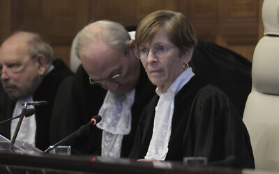 Presiding judge Joan Donoghue opens the session at the International Court of Justice, or World Court in the Netherlands, Friday, Jan. 26, 2024. The court issued emergency orders against Israel following South African allegations of genocide by Israel in Gaza, but did not order a ceasefire in the war against Hamas. (AP Photo/Patrick Post)