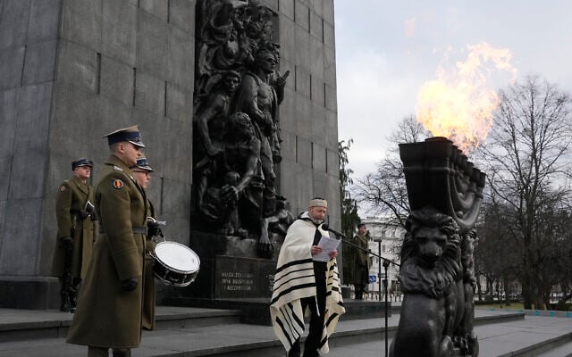 A rabbi says prayers on the eve of the 79th anniversary of the liberation of Auschwitz-Birkenau at the Monument to the Heroes of the Ghetto, in Warsaw, Poland, Jan. 26, 2024 (AP Photo/Czarek Sokolowski) A rabbi says prayers on the eve of the 79th anniversary of the liberation of Auschwitz-Birkenau at the Monument to the Heroes of the Ghetto, in Warsaw, Poland, Jan. 26, 2024 (AP Photo/Czarek Sokolowski)