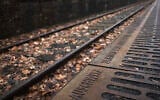 The name of the Nazi death camp Auschwitz photographed at 'Gleis 17', Track 17, the memorial site for the train transportation from Berlin to the camp, on International Holocaust Remembrance Day in Berlin, Jan. 27, 2024 (AP/Markus Schreiber)