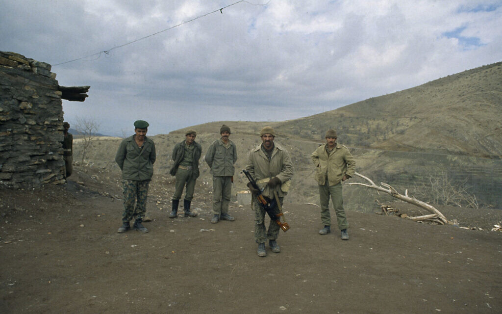 Iraqi troops patrol mountainous area during the Iran-Iraq war, January 24, 1981. (AP Photo/Bill Foley)