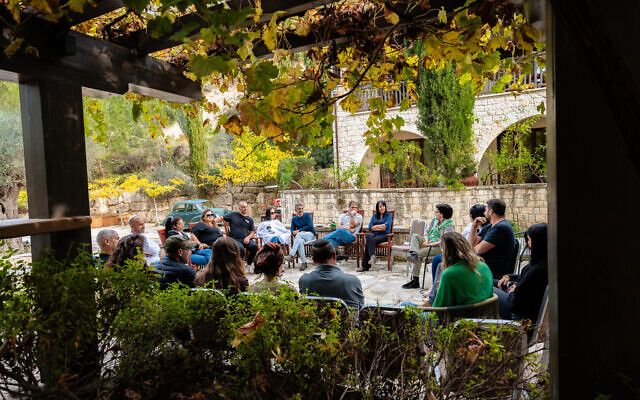 Participants in a discussion circle at the Secret Forest retreat center in Cyprus, in an undated courtesy photo. (Nir Davidzon/Secret Forest)