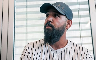 Saeed Mousa, an Arab Israeli who was assaulted by a Jewish Israeli mob, at a court hearing at the District Court in Tel Aviv, October 24, 2022 (Flash90/File)