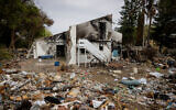 The remains of the home of Pessi Cohen, where Hamas held 15 hostage on October 7, 2023, in Kibbutz Be'eri, seen on November 19, 2023. (Chaim Goldberg/Flash90)