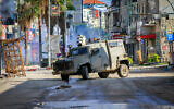 Illustrative: Israeli security forces operate in the West Bank city of Jenin, December 14, 2023. (Nasser Ishtayeh/Flash90)