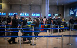 Passengers at the Ben Gurion Airport near Tel Aviv, on December 26, 2023. (Arie Leib Abrams/Flash90)
