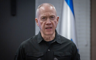 Defense Yoav Galant holds a joint press conference with minister of Finance Bezalel Smotrich (not seen) in Jerusalem, on December 26, 2023. (Chaim Goldberg/Flash90)