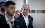 Prime Minister Benjamin Netanyahu arrives for a Likud party meeting at the Knesset in Jerusalem on January 1, 2024. (Yonatan Sindel/Flash90)