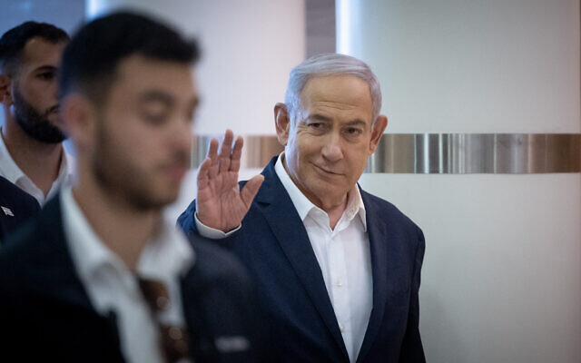 Prime Minister Benjamin Netanyahu arrives for a Likud party meeting at the Knesset in Jerusalem on January 1, 2024. (Yonatan Sindel/Flash90) Prime Minister Benjamin Netanyahu arrives for a Likud party meeting at the Knesset in Jerusalem on January 1, 2024. (Yonatan Sindel/Flash90)