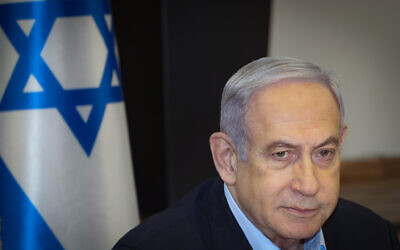 Prime Minister Benjamin Netanyahu leads a weekly cabinet meeting at Hakirya base in Tel Aviv on January 7, 2024. (Yariv Katz/POOL/Flash90)
