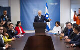 Opposition Leader and chairman of the Yesh Atid party MK Yair Lapid leads a faction meeting at the Knesset on January 8, 2024. (Yonatan Sindel/Flash90)