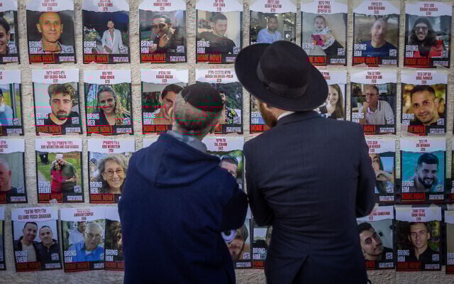 Jews pray for the IDF's success in the war against Hamas, for the return of the Israeli hostages held by Hamas terrorists in Gaza, and in memory of the people murdered in the October 7 massacre, at the Western Wall, Judaism's holiest prayer site, in the Old City of Jerusalem, January 10, 2024. (Chaim Goldberg/Flash90) Jews pray for the IDF's success in the war against Hamas, for the return of the Israeli hostages held by Hamas terrorists in Gaza, and in memory of the people murdered in the October 7 massacre, at the Western Wall, Judaism's holiest prayer site, in the Old City of Jerusalem, January 10, 2024. (Chaim Goldberg/Flash90)